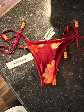 Princess Polly bikini bottom.